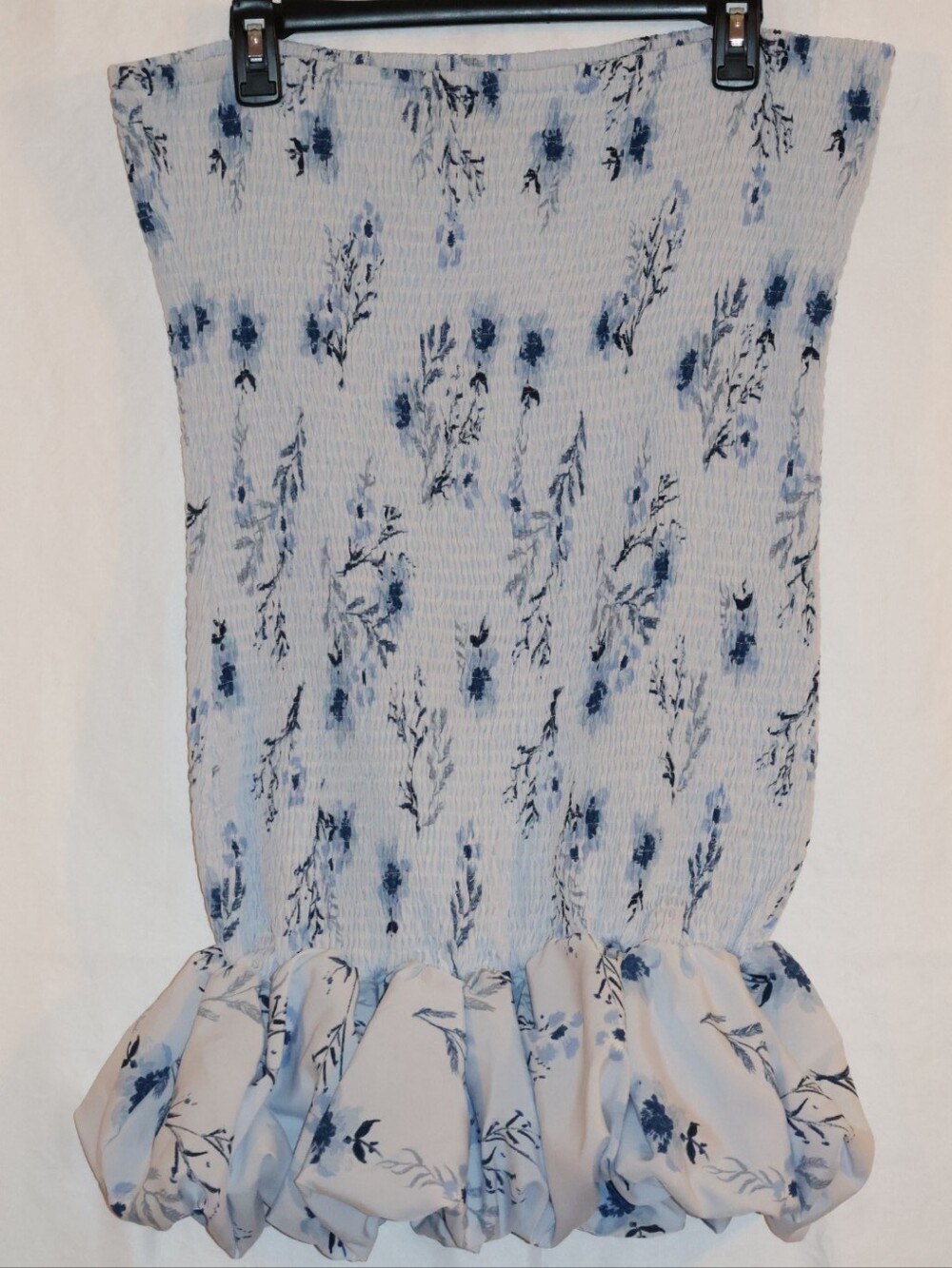 PrettyLittleThing Blue Floral Strapless Smocked Mini Dress With Bubble Hem.